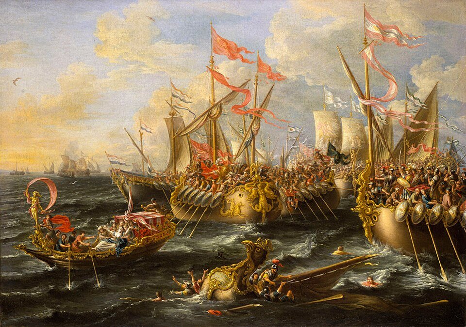 Baroque painting of ancient warships with red banners clashing at sea, oars extended, figures falling into the water.